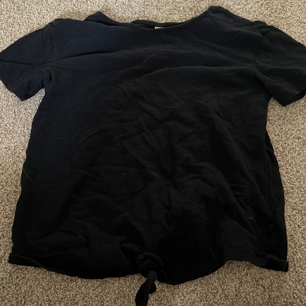 Black top with tie at the bottom